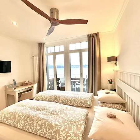 호텔 Boutique Hotel & Restaurant Niesenblick - Lakefront Rooms With Balcony On Lake Thun - Self Check In & Digitale Reception